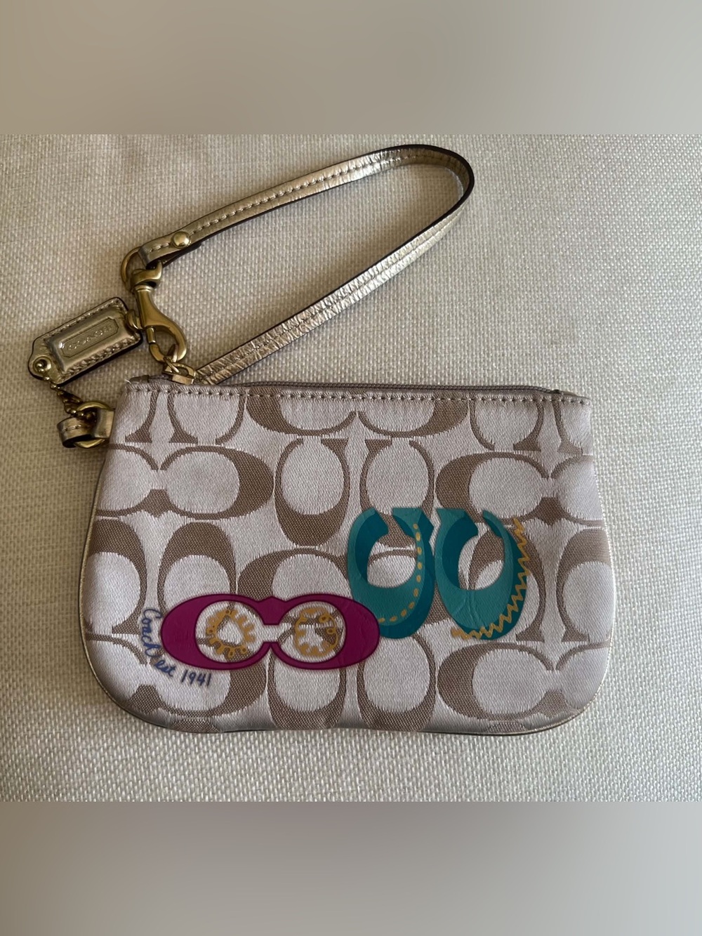 Coach Signature Canvas Wristlet with Teal & Pink Graphic Accents